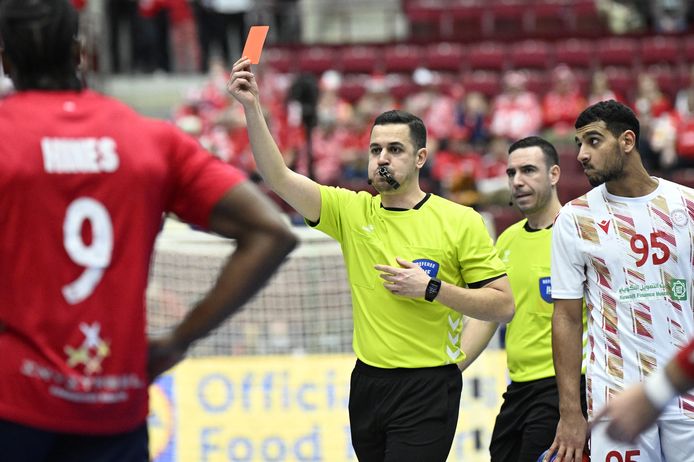 Referee Karim Kasmi removes Paul Skoruba from the field