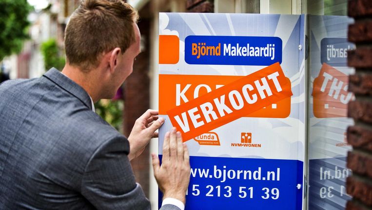 Amsterdamse makelaars concurreren op prijs om toch opdrachten binnen te halen. Beeld anp