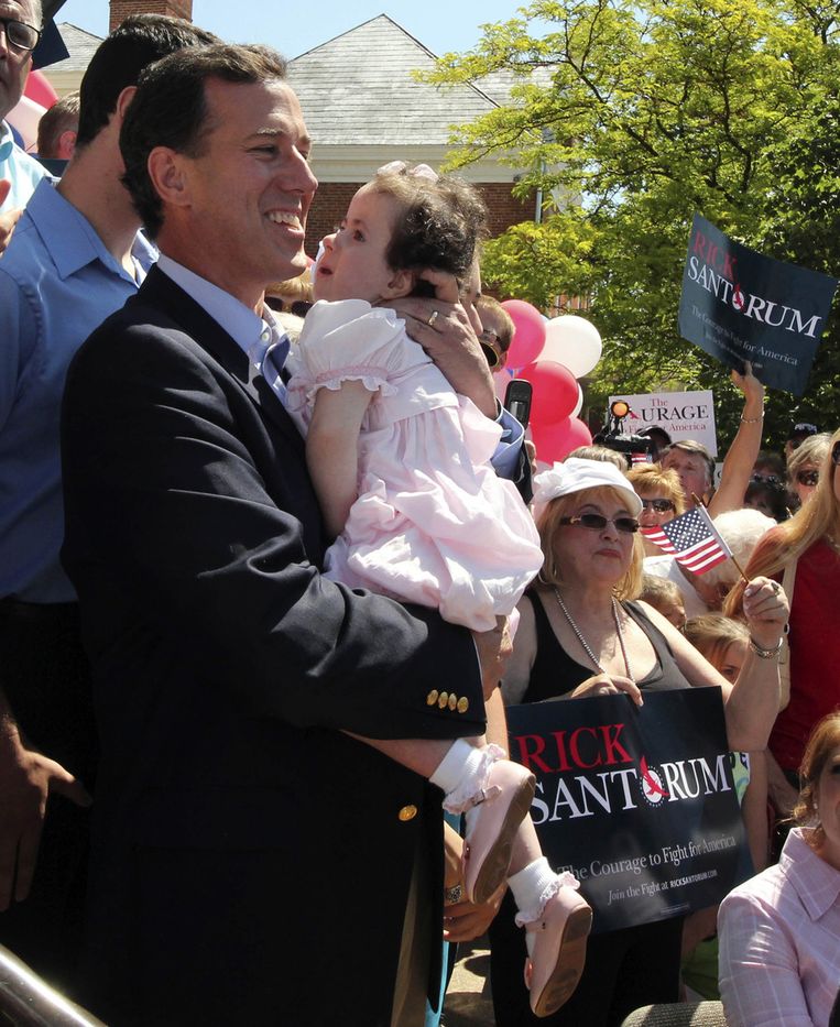 Rick Santorum in juni 2011 met zijn zieke dochtertje Bella Beeld ap