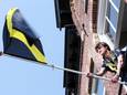 De NAC-vlag wappert weer op veel plaatsen in Breda.