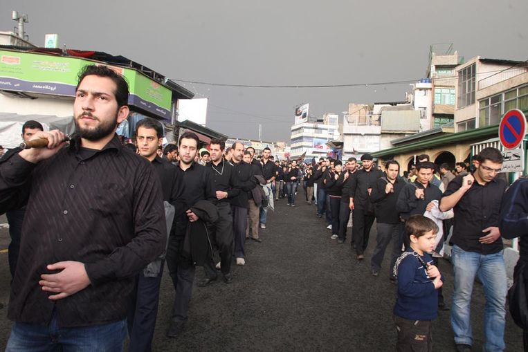 De demonstraties in Iran vallen samen met de jaarlijkse tien dagen durende Ashura-herdenking, zoals hier op de foto. Beeld EPA