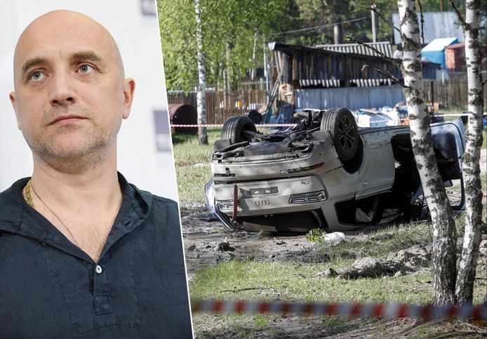 Rechts de zwaar beschadigde Audi Q7 waarin Zachar Prilepin (47) zat toen er een bom ontplofte. Hij raakte gewond, zijn chauffeur kwam om.
