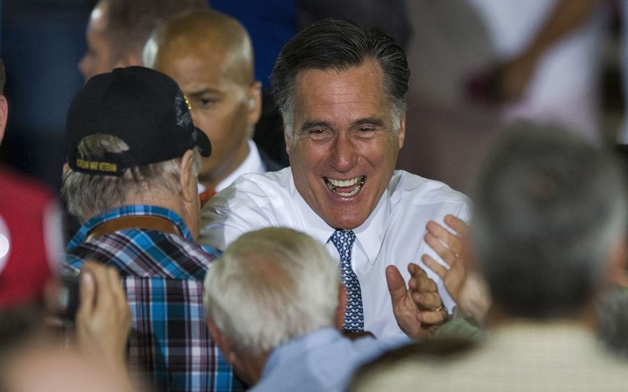 De Republikeinse presidentskandidaat Mitt Romney gisteren tijdens een campagnebijeenkomst in Florida.