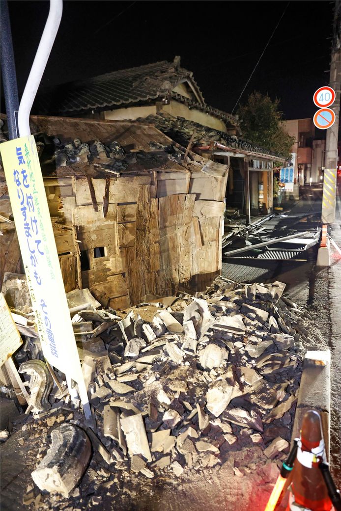 Een beschadigd huis in Koorimachi.