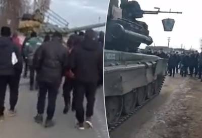 Ongewapende Oekraïners jagen Russische tanks weg