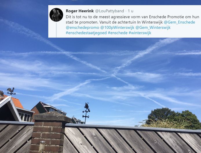 Rogier zag in de lucht lvliegtuigstrepen die wel érg op het wapen van Enschede leken. Het doet denken aan een twist tussen de twee steden na een staaltje Twente-promotie in Winterswijk.