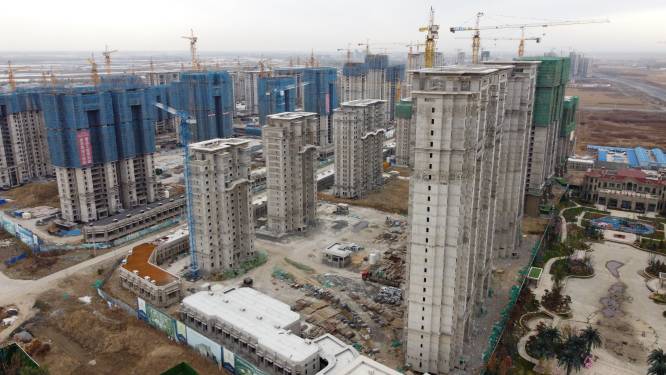 Een jaar en vele betaaldeadlines later leeft Chinees vastgoedbedrijf Evergrande nog steeds