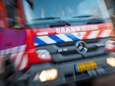 Grote brand in Loods leiden, brandweerman raakt gewond