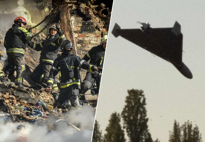 Hulpdiensten doorzoeken het puin van een ingestort gebouw in Kiev. Er werden maandag meerdere drones vastgelegd op beeld boven de Oekraïense hoofdstad.