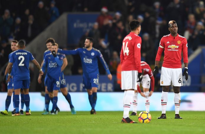LEICESTER, ENGLAND - DECEMBER 23: Paul Pogba (R) of Manchester United looks dejected after the opening goal scored by Jamie Vardy of Leicester City during the Premier League match between Leicester City and Manchester United at The King Power Stadium on December 23, 2017 in Leicester, England.  (Photo by Michael Regan/Getty Images)