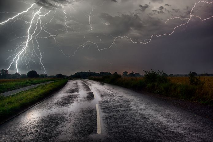 Bolts of Lightning caught at the end of the road. onweer
