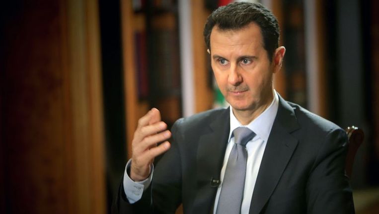 De Syrische president Bashar al-Assad tijdens het interview met AFP. Beeld afp