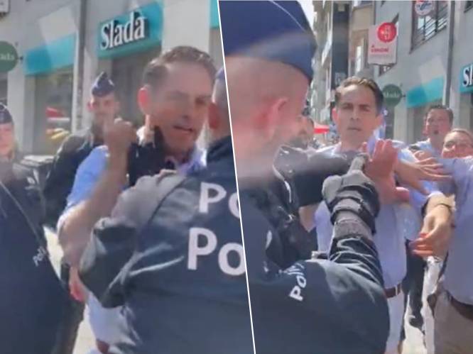 Nieuwe beelden tonen duw- en trekwerk tussen Van Grieken en politie, waarna agent Vlaams Belang-voorzitter in gezicht slaat