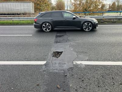 Gat in wegdek A58 bij Ulvenhout, rijstrook afgesloten voor reparatie