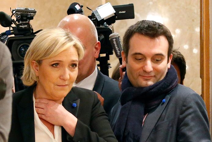 Front National-leider Marine Le Pen (L) en haar rechterhand Florian Philippot (R)