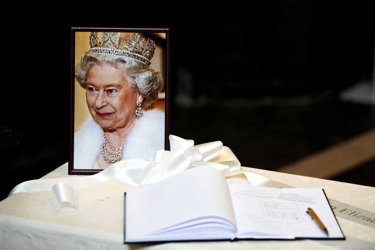 Upon entering, visitors can sign a register, with the late Queen watching kindly from a photo.  Image ANP