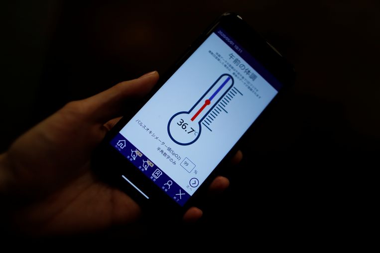Een app die in Japan wordt gebruikt om het werk van zorgmedewerkers te verlichten.  Beeld REUTERS
