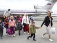 16 september 2022: Maria Alekseyevna Lvova-Belova (rechts) arriveert met 125 kinderen uit het oosten van Oekraïne in Moskou.