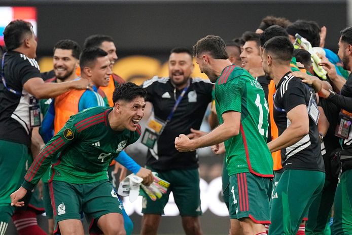 Ajax's Edson Alvarez (left) and Feyenoord's Santiago Jimenez celebrate Mexico's Gold Cup Final victory over Panama, after Jimenez's winning goal shortly before time.