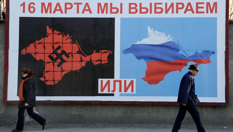 Verkiezingsposter in Sebastopol voor het Krim-referendum, 11 maart 2014. Beeld AFP