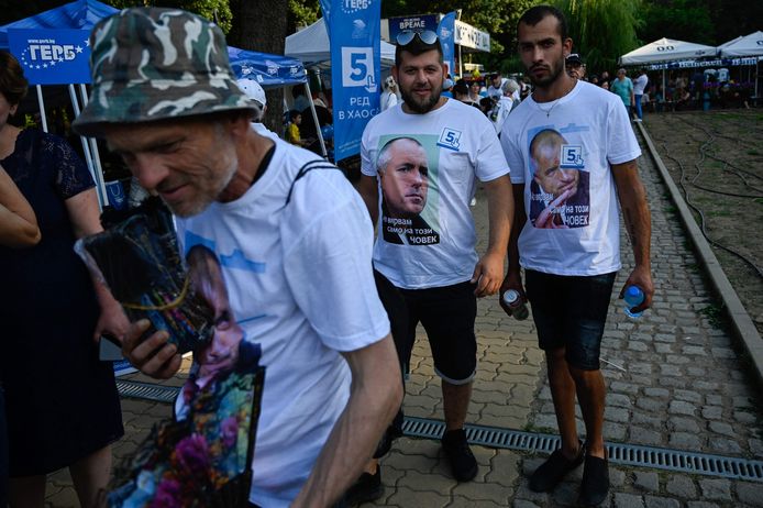 Supporters wearing tee-shirts with the portrait of former Bulgaria's Prime Minister and leader of centre-right GERB party Boyko Borisov take part of a pre-election rally on July 9, 2021. - Bulgaria holds snap parliamentary elections on July 11, 2021 after failing to form a government after the last vote in the spring 2021. (Photo by Nikolay DOYCHINOV / AFP)