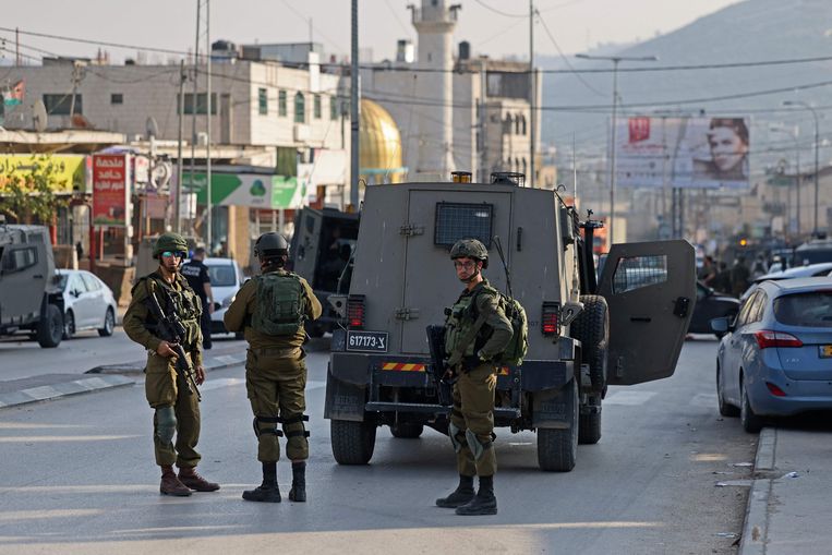 Israëlische veiligheidstroepen in Huwara. Beeld AFP