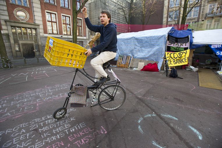 Occupy Amsterdam, vlak voordat ze moesten vertrekken van het Beursplein naar de Zuidas. Beeld anp
