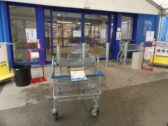 A few stray shopping carts were left behind at the entrance.