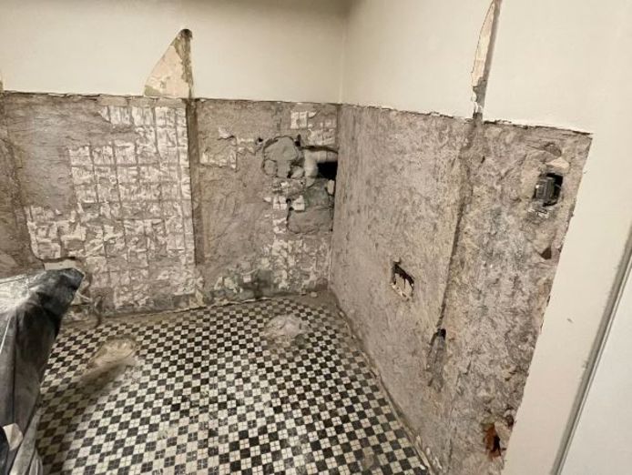 During renovations, contractors found the antique model hidden behind a collapsed wall in the bathroom.