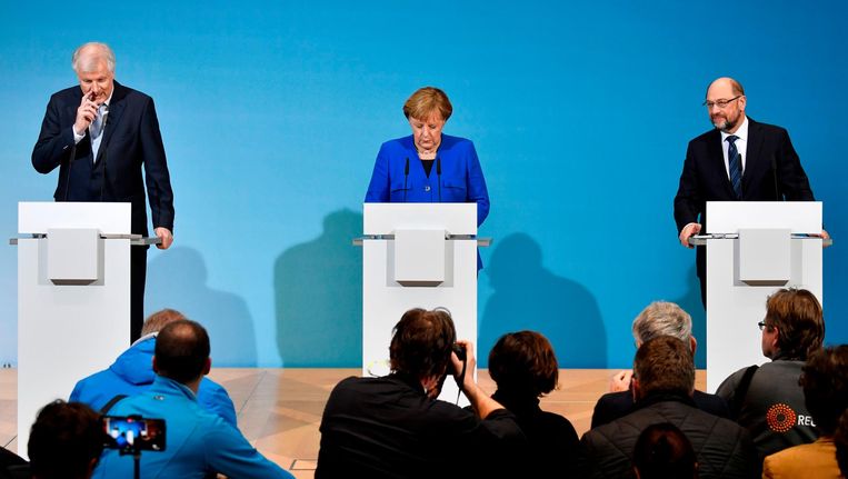 Seehofer, Merkel en Schulz op de presentatie van het eventuele regeerakkoord. Beeld afp