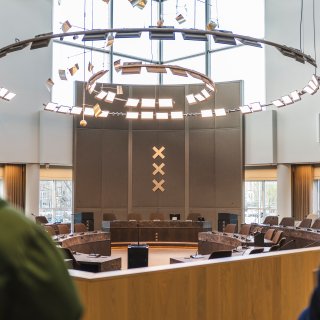 Amsterdam council chamber sheds red accents for taupe, cream and beige – could have been more rebellious