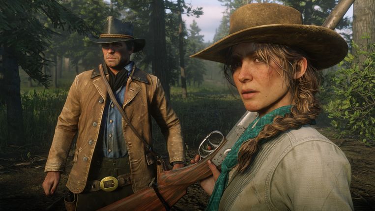 Spelerpersonage Arthur Morgan en een van de vrouwelijke outlaws die de Van der Linde-bende bevolken. Beeld Rockstar Games