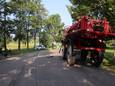 Botsing op de Holstweg bij Den Nul tussen landbouwvoertuig en personenauto.