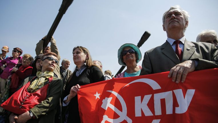 Aanhangers van de Oekraïense communistische partij in het voorjaar van 2015 Beeld epa