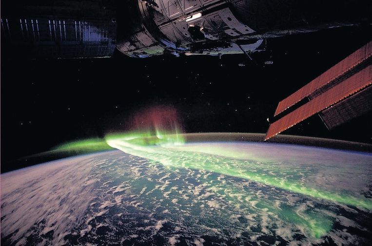 Het noorderlicht bezien vanuit de ruimte. Beeld AFP/NASA