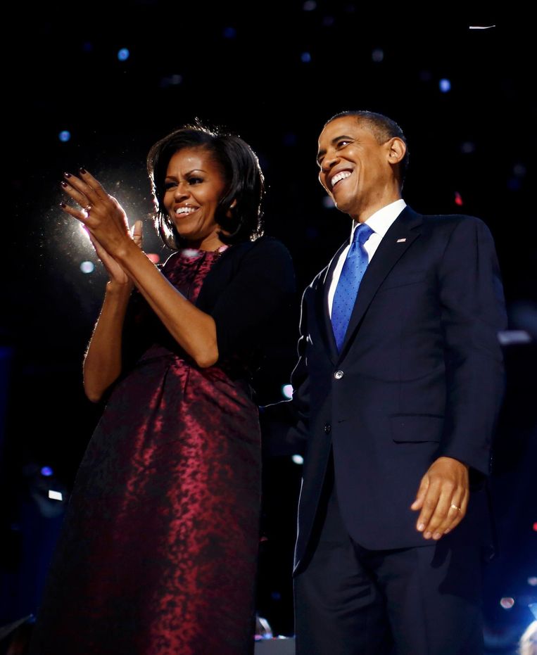 Obama met zijn vrouw Michelle, na de verkiezingen in 2012 Beeld reuters
