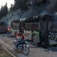 Bussen bedoeld voor evacuatie Syrische dorpjes in brand gestoken