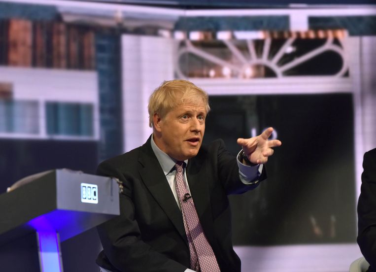 De Britse premier Boris Johnson speelde een belangrijke rol bij de aanstelling van de 53-jarige Tim Davie. Beeld REUTERS