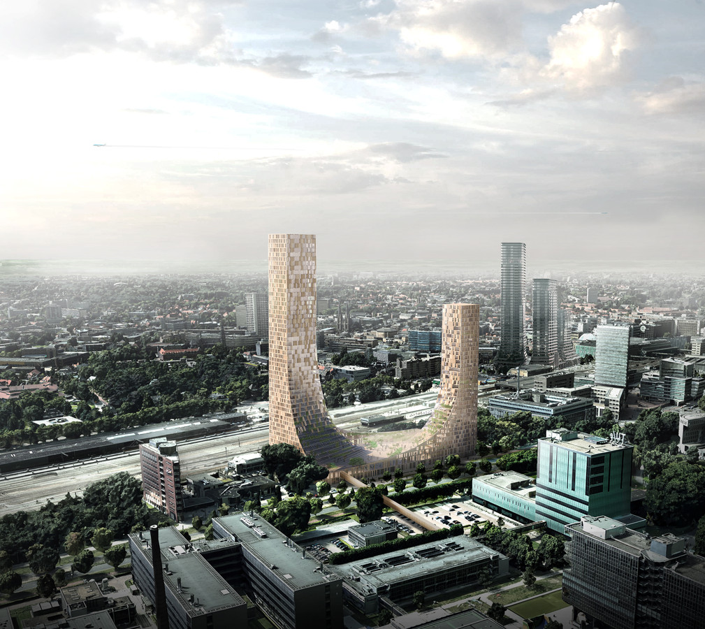 Impressie van het gebouw de Dutch Mountains dat in Eindhoven moet verrijzen. Rechtsachter de torens van District E die op het Stationsplein zijn gepland. Op de voorgrond de gebouwen op de TU/e Campus, daarachter de Prof. dr. Dorgelolaan.