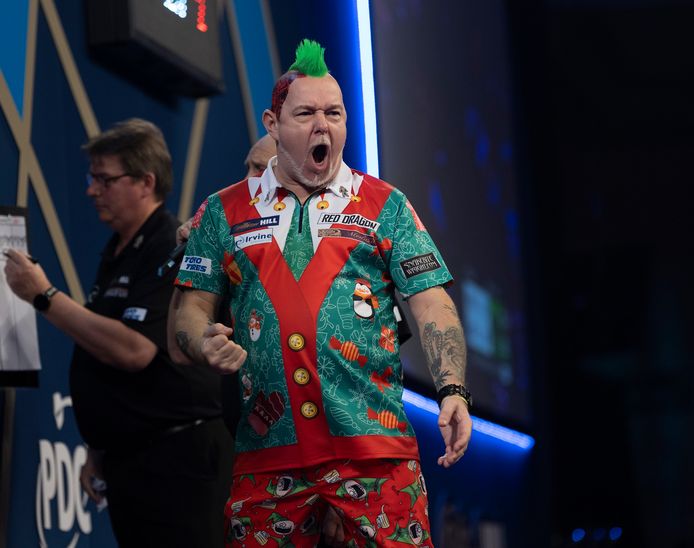 Peter Wright won ondanks een stroeve start van Damon Heta.