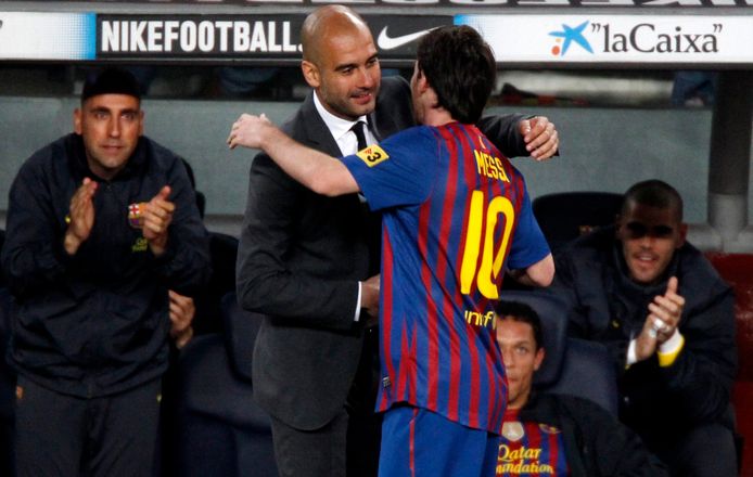 Pep Guardiola en Lionel Messi.