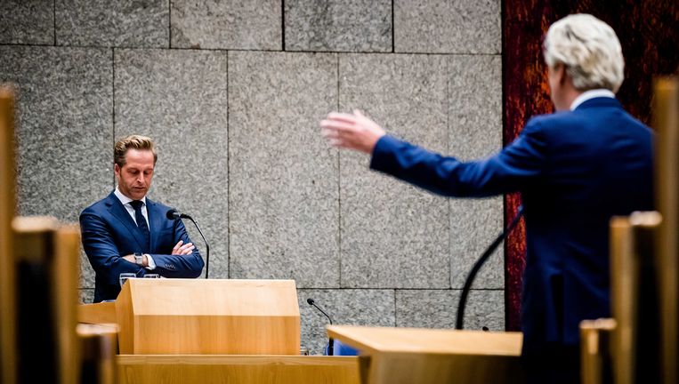 Minister Hugo de Jonge van Volksgezondheid en Geert Wilders (PVV) tijdens het Tweede Kamerdebat over het coronavirus deze week. Beeld Bart Maat/ANP