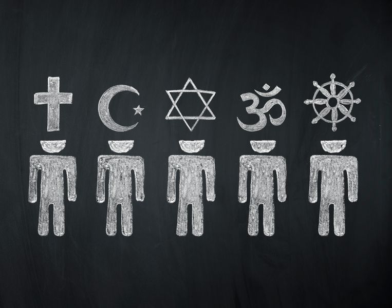 Tekens van de wereldreligies op een blackboard Beeld Getty Images/iStockphoto
