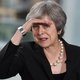 Theresa May zou 'no deal'-brexit in september beginnen voorbereiden