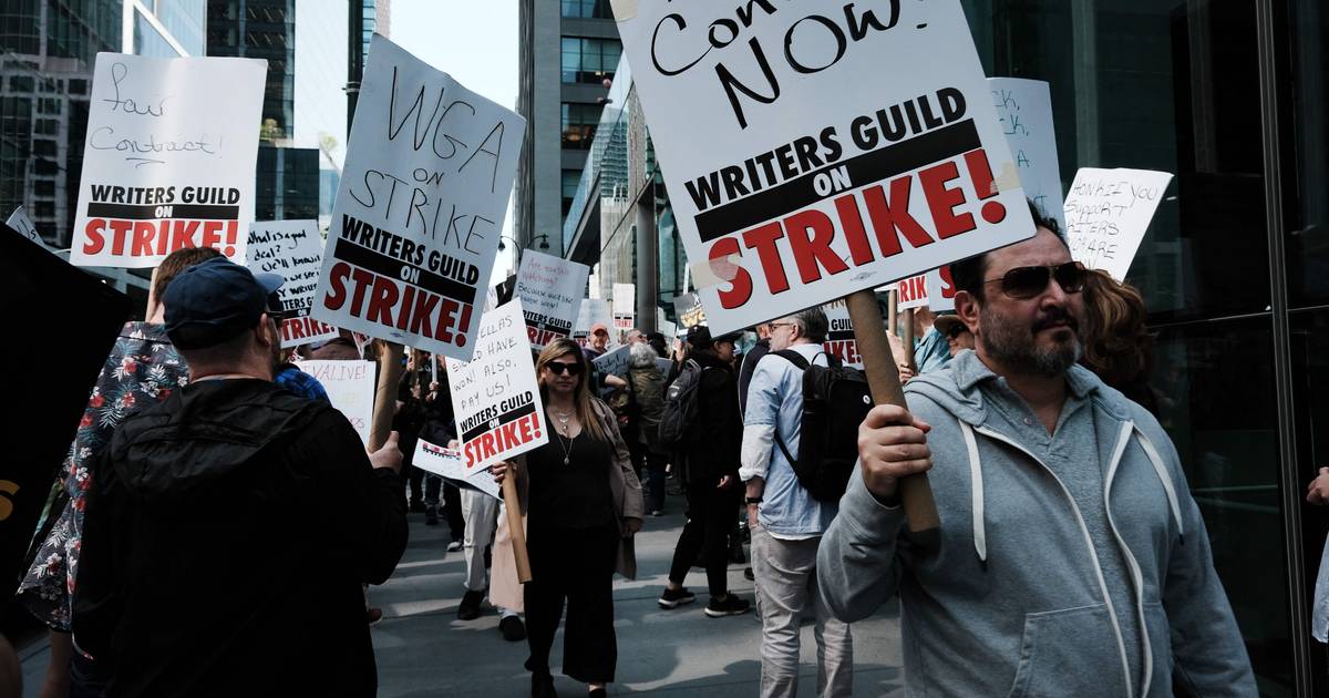 Hollywood executives reach labor agreement, writers go on strike |  showbiz