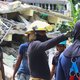 Dodental aardbeving Haïti loopt op tot 1.297