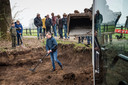 Tim Hummelink uit Goor stapt in een gegraven gat om met een metaaldetector te zoeken.