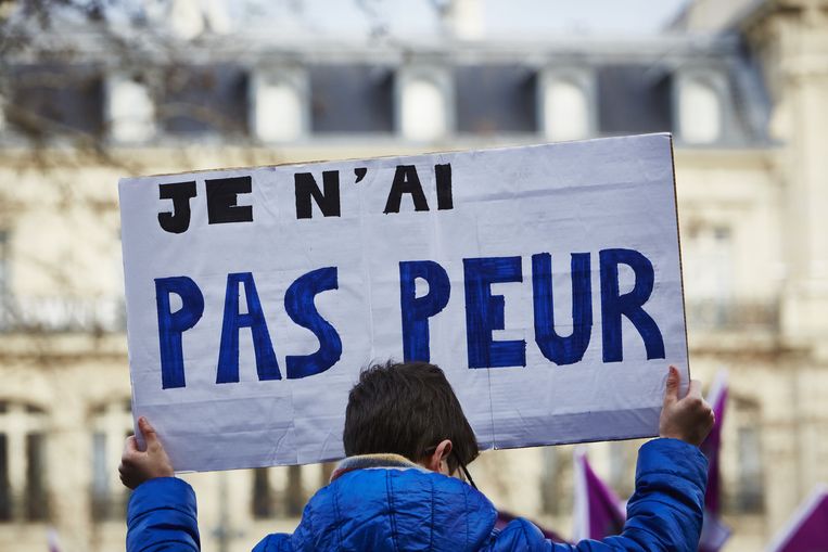 Belangstellenden tijdens de mars van de republiek op het Place de la Republique, op 11 januari. Beeld anp