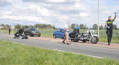 Man in scootmobiel in botsing met motor in Wamel; met spoed naar ziekenhuis