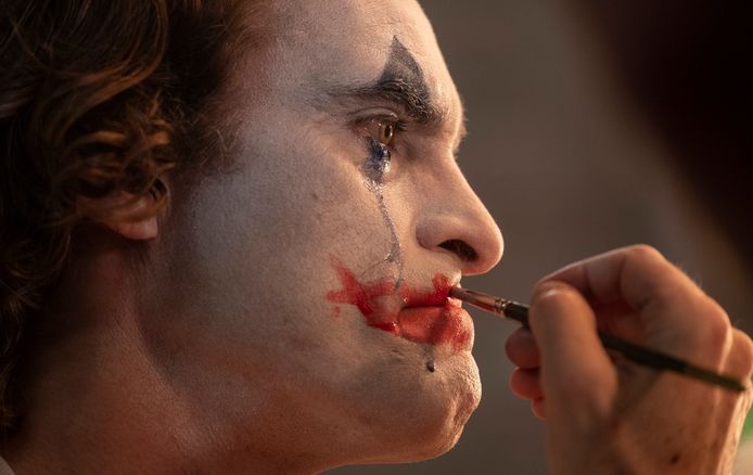Joaquin Phoenix als The Joker.